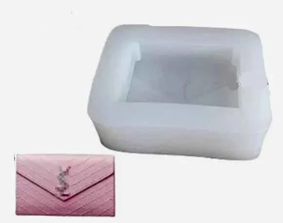Borsetta Yves Saint Laurent Griffe. Moda YSL Stampo in silicone anche per Candele