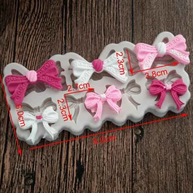 Fiocchi e Papillon. Stampo in Silicone con 7 Fiocchi