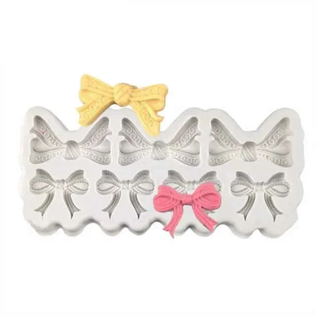 Fiocchi e Papillon. Stampo in Silicone con 7 Fiocchi
