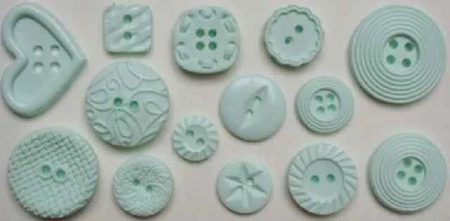 Bottoni in 14 forme decorate. Stampo in silicone.