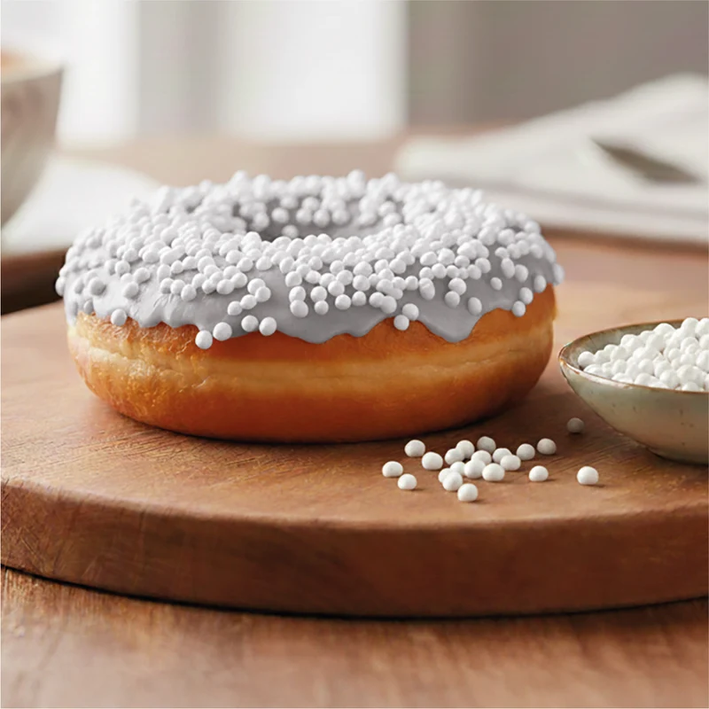 DECORACIÓN DE AZÚCAR DEKOCRUNCHIES SABOR COCO 100G