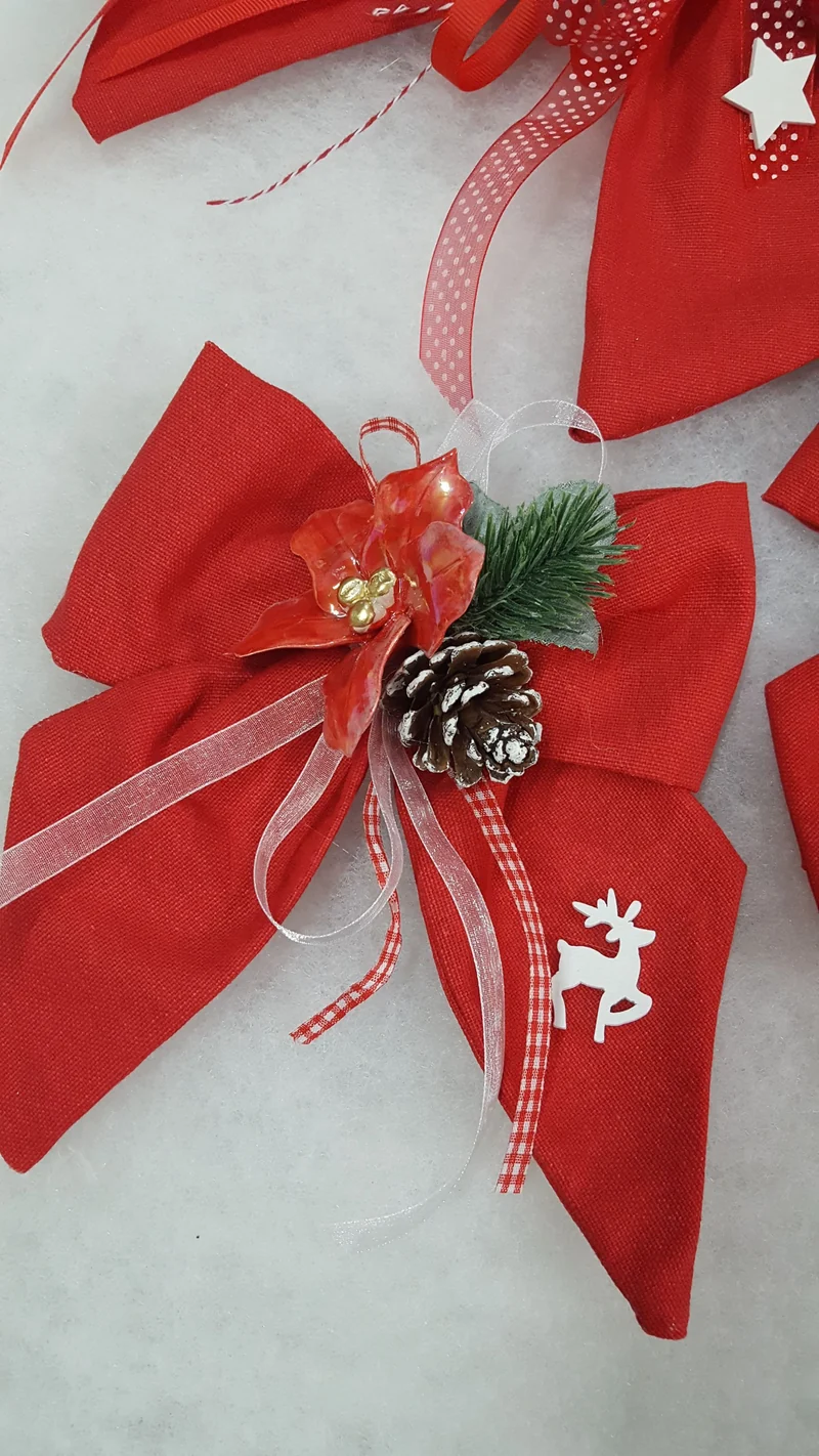 Fiocco 19cm a punte con stella in ceramica
