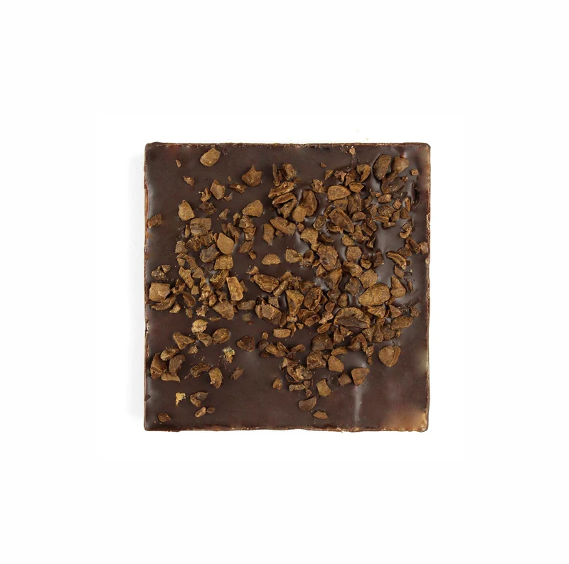 Milk chocolate bar and cocoa beans