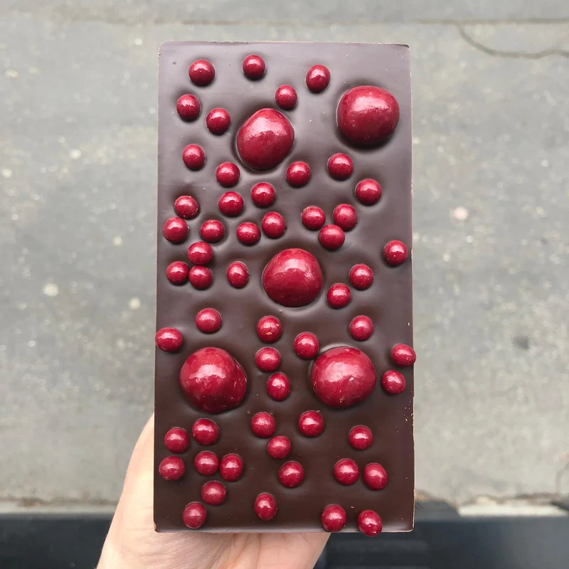 Cioccolato Fondente Monorigine 71% Madagascar con croccantini al lampone